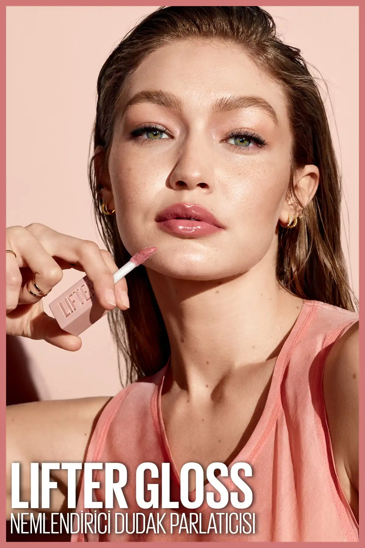 New York Lifter Gloss Moisturizing Lip Gloss - 003 Moon برند   Maybelline New York(میبلین نیویورک) به رنگ   صورتی