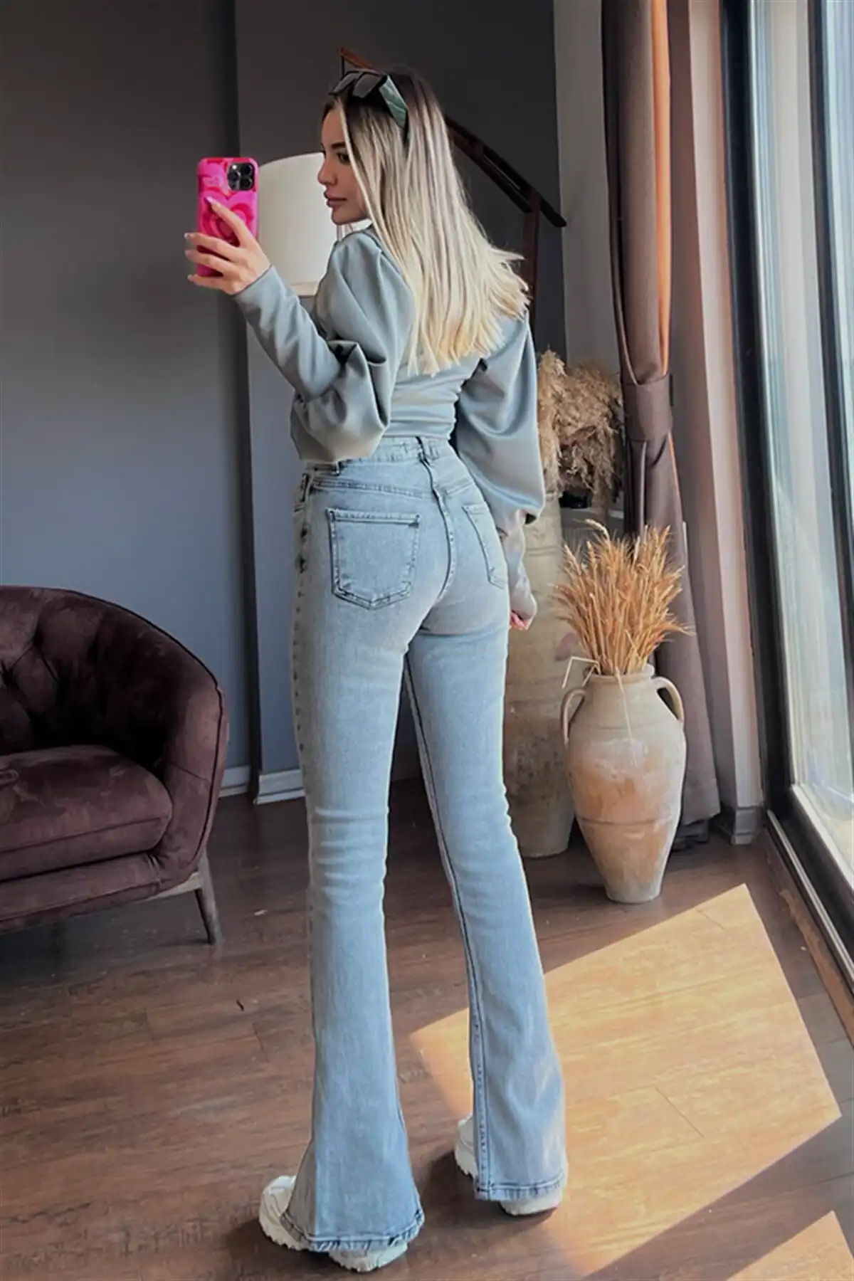 شلوار جین زنانه جین اسنو واش کمری بالا لاکرا گشاد ساق جلو برند   به رنگ  آبی