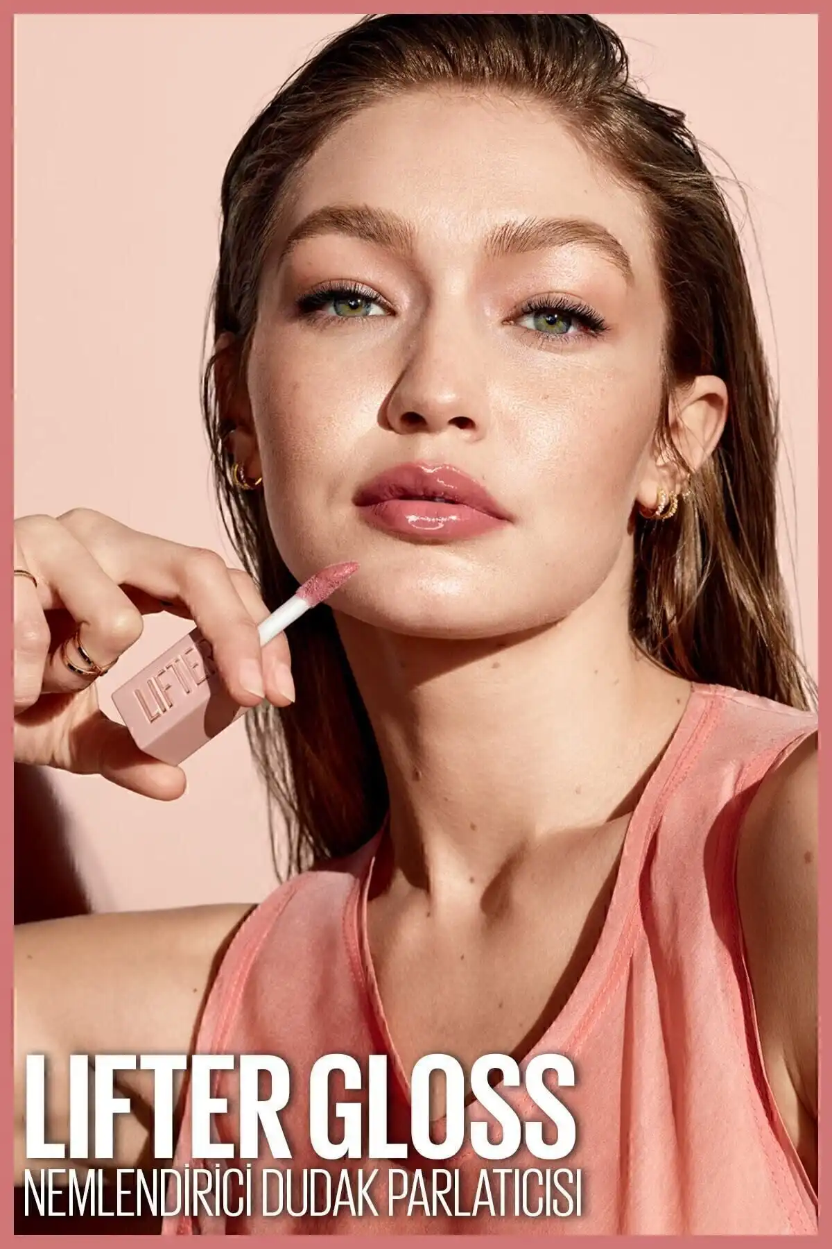 New York Lifter Gloss Moisturizing Lip Gloss - 003 Moon برند   Maybelline New York(میبلین نیویورک) به رنگ   صورتی